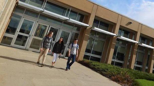 Students Walking outside of health building